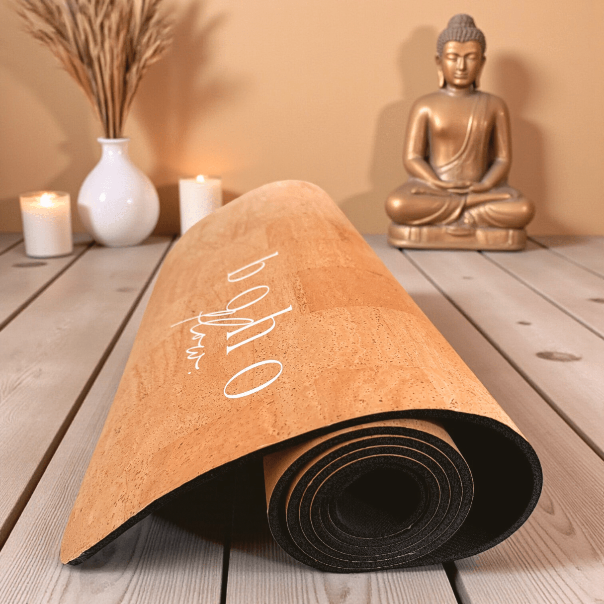 Image shows Boho Flow Luxe Leather mat close up, shot in an elegant studio setting on a wooden floor.